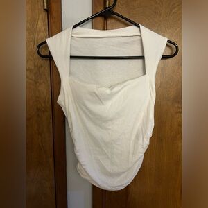 white tank top with bra pads inserted, xs